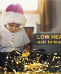Child holding 4 Pack 33 Feet 100 Warm White LED Fairy Lights Battery Operated With Remote Control Timer IP67 Waterproof