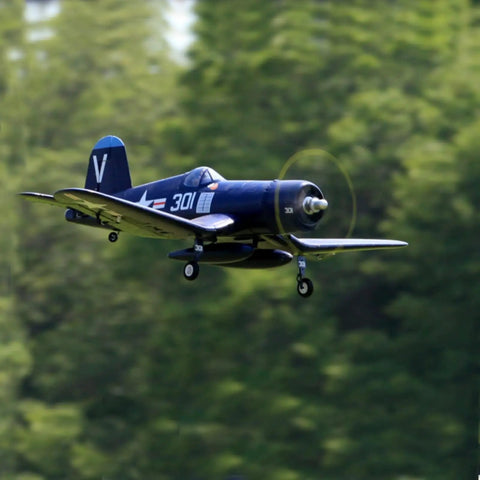 F4U Corsair 800mm RC Plane Blue Ready To Fly 4 Channel Remote Control Airplane flying in green outdoor setting