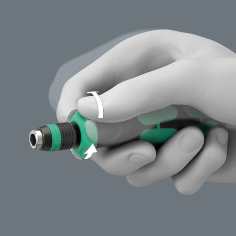 Close-up of hand using Bitholding Ratcheting Screwdriver With Rapidaptor Quick Release Chuck 1/4 Inch Drive for easy bit change