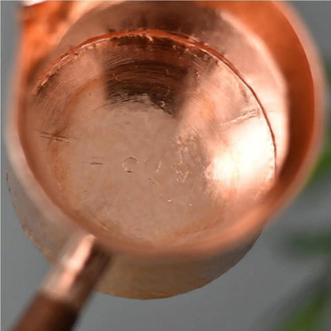 Interior view of Copper Teapot With Wooden Handle Dope Hammered Turkish Coffee Pot Multipurpose Kettle For Tea Coffee.