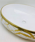 Sleek Gold Ceramic Vessel Sink Oval Bathroom Basin With Luxe Shine For Quick Vanity Upgrades; detailed view of gold accents.
