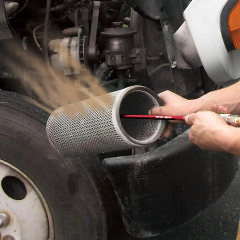Using Pro Grade High Pressure 24 Air Comb Filter And Radiator Cleaner With 90 Degree Reach to clean vehicle air filter