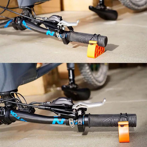 Close-up of bike handlebars secured in Two Pack Portable Bike Repair Stand With Upside Down Handlebar Holder Height Adjustable Feet.