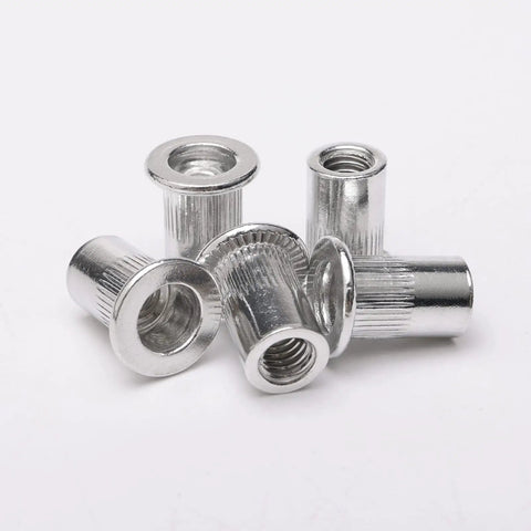 Close-up of 100 Piece M6 Flat Head Threaded Aluminum Rivet Nut Blind Insert Nut Set With Tool For Easy Installation, showing rivet nuts detail