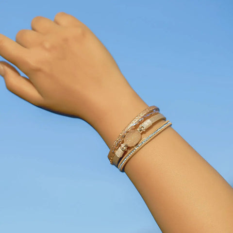 Premium Gold Boho Leather Wrap Bracelet Featuring Chunky Crystal Beads And Sparkling Rhinestone Layers With Strong Magnetic Clasp on wrist.