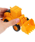 Hand holding yellow model from 4 Piece Front End Loader Plastic Engineering Vehicle Models For Compact Construction Trucks Built For Kids To Boost Hand Eye Coordination And Safe Outdoor Play With Durable Kid Safe Design And Realistic Details.