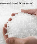 Hands holding environmentally friendly PP raw material pellets