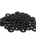 50 Piece M6 X 12mm Flat Washers Black Coated 304 Stainless Steel Heavy Duty Corrosion Resistant stacked on white surface.