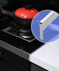 Stainless Steel Stove Gap Covers 2 Pack Notched Design, close-up of cover on kitchen counter next to cooktop