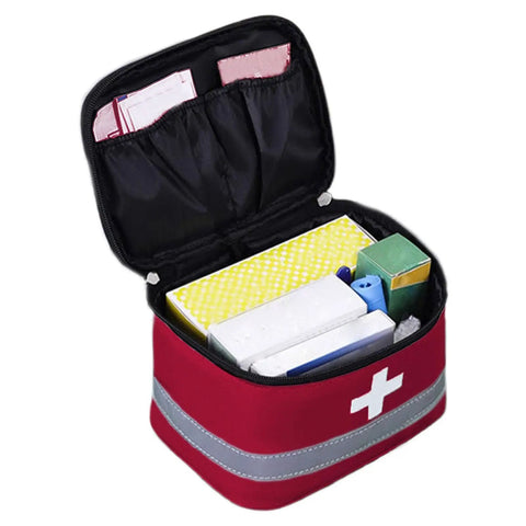 Open red Multilayer Waterproof Medical Organizer Bag For Travel Lightweight Compact Healthcare Carry Pouch showing compartments with supplies.