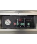 Control panel of Heavy Duty Double Chamber Vacuum Sealer showing timer and vacuum gauge for kitchen freshness.