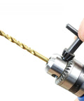 Rock Solid Heavy Duty Drill Press Chuck Key Wrench Set With 3/8 And 1/2 Inch Replacement Keys Forged From Rugged Carbon Steel in use on drill.