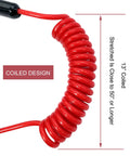 Close-up of coiled red safety cord, part of Emergency Kill Switch Lanyard Replacement For Jet Ski And Personal Watercraft.