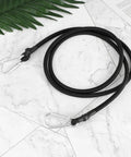 4 Pack Elastic Bungee Cord Straps With Carabiner Hooks for Luggage Camping and Outdoor Gear on marble surface