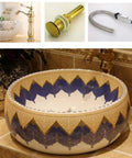 Knockout Round Ceramic Vessel Sink With A Dope Sprayed Enamel Finish Solid Pick For Countertop Setup Perfect Mediterranean Bathroom Washbasin design with gold and blue patterns.