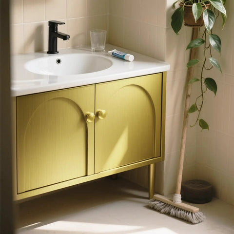 Gold self adhesive wallpaper peel and stick metallic contact paper for walls and surfaces on a bathroom cabinet