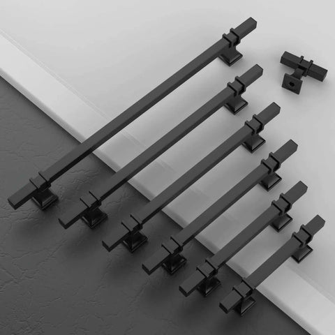 Heavy Duty Matte Black 5 Inch Cabinet Handles For Kitchen Drawers And Cupboards 10 Pack Modern Drawer Pulls arranged on a gray surface.