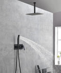 Shower System, 10-Inch Ceiling Rain Head with Handheld Spray, Matte Black, featuring water flow against a sleek wall.