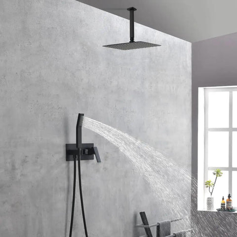 Shower System, 10-Inch Ceiling Rain Head with Handheld Spray, Matte Black, featuring water flow against a sleek wall.
