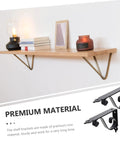 Heavy Duty Iron Triangle Shelf Brackets Black Metal Corner Supports 4 Pack on a wall with wood shelf and decorative items.