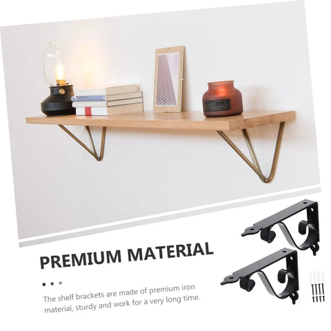 Heavy Duty Iron Triangle Shelf Brackets Black Metal Corner Supports 4 Pack on a wall with wood shelf and decorative items.