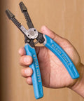 Person holding Heavy Duty Wire Cutters With Lock And Built In Wire Stripper, 8 To 18 AWG Solid And 10 To 20 AWG Stranded, blue handles