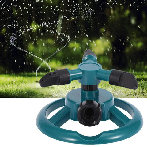 3 Nozzle 360 Degree Circular Rotating Garden Sprinkler For Lawn And Yard in action, showing water spray pattern on grass