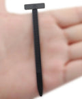 Heavy Duty Black Nylon Universal Cable Tie Buckles Push Mount Zipper Straps With Pin And Button Design shown on hand