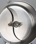 Stainless steel blade of Beast Of A 1500G Grain Grinder Mill With 3500W Electric Motor, interior view of milling machine.