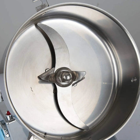 Stainless steel blade of Beast Of A 1500G Grain Grinder Mill With 3500W Electric Motor, interior view of milling machine.