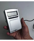Slick Pocket Sized Surface Roughness Tester Heavy Duty Digital Gauge for Metal Wood Plastic Texture Analysis held in hand.