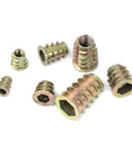 Close-up of rugged zinc alloy wood insert nuts with hex drive from Rugged Zinc Alloy Socket Cap Screws Set M4 M5 M6 M8 M10 For Wood Insert Nuts.