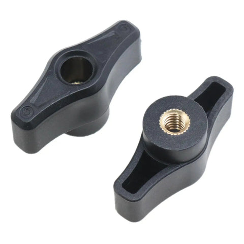 Four Pack Quarter Twenty Thru Knobs For T Track Woodworking Jigs featuring durable black ergonomic knobs with 1/4 20 threaded inserts.