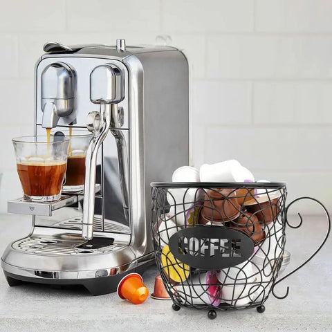 Massive K Cup Pod Holder For Countertop next to espresso machine, holding 40 coffee pods, black rustproof steel basket, home coffee bar.