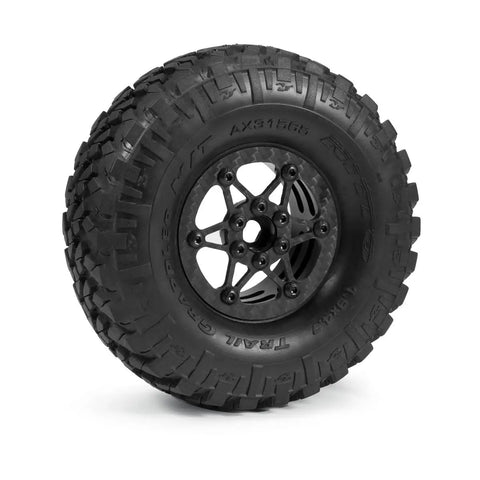 Crush The Trails With These Sick 1.9 Carbon Fiber Beadlock Wheels For RC Crawler Cars Featuring CNC Aluminum Hubs Quick Tire Swaps And Black Finish SCX10 TRX4 Gmade, showcasing black tire with detailed tread.