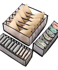 Slick Nylon Mesh Drawer Divider Set For Bras Socks And Lingerie Dresser Sorting Bins, showcasing divided compartments for organization.
