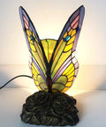 Tiffany Style Butterfly Table Lamp With Stained Glass Multicolor Night Light Blue Glass Accent For Living Room Or Bedroom, Eye Catching Home Decor And Gift Ready Lamp For Kids Or Friends, showing a lit stained glass butterfly on ornate base