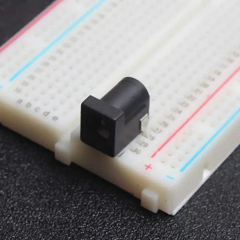 Breadboard Friendly 2.1mm PCB Mounting Female DC Power Barrel Jack on prototyping breadboard