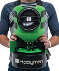Person wearing Lithium Ion Chest Spreader With Harness System, Adjustable Feed Rate, 24 Volt Power, 35 Pound Hopper, Ideal For Lawn Care
