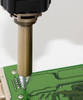 Three Pack Desoldering Nozzles 1.6 mm For Soldering Gun Suction Nozzle Set in use on circuit board
