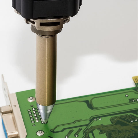 Three Pack Desoldering Nozzles 1.6 mm For Soldering Gun Suction Nozzle Set in use on circuit board