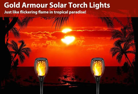 Two Pack Upgraded Solar Torch Lights With Realistic Dancing Flame LEDs 96 LED Dusk To Dawn Flicker 42.9 Inch Tall Outdoor Waterproof Garden Path Lighting For Patio Walkways, against a sunset backdrop