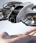 Mini Drone For Kids Super Easy To Fly With 3D Flips And 360 Degree Rotation, Totally Beginner Friendly Toy For Boys And Girls hovering near hand
