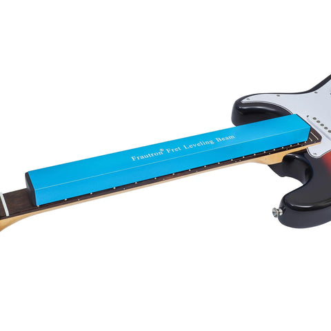 Professional Guitar Fret Leveling Beam And Sanding Block Precision Ground Steel Rail For Quick Fret Sanding And Perfect String Action Setup on a guitar neck.