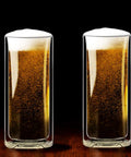 Slick Double Wall Insulated Glass Tumbler Set Featuring 16 Oz Collins Style Highball Cups with craft beer on a wooden table.