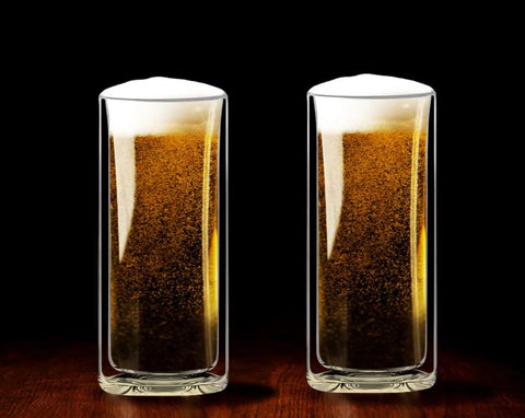 Slick Double Wall Insulated Glass Tumbler Set Featuring 16 Oz Collins Style Highball Cups with craft beer on a wooden table.