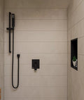 HomeStock Black Matte Shower Faucet System with Pressure Balance Valve and Single Lever Handle installed in a modern shower.