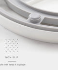 Close-up of non-slip soft feet on 360 Degree Rotating Lazy Susan Organizer With 3 BPA Free Removable Clear Bins for Kitchen Cabinets.