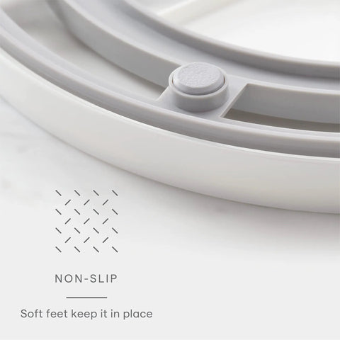 Close-up of non-slip soft feet on 360 Degree Rotating Lazy Susan Organizer With 3 BPA Free Removable Clear Bins for Kitchen Cabinets.