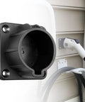 Close-up of Built Tough SAE J1772 EV Charger Holder and Nozzle Holster Dock with black polymer mount on wall.